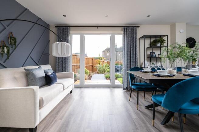 A welcoming hub for family life, with French doors leading straight into the garden