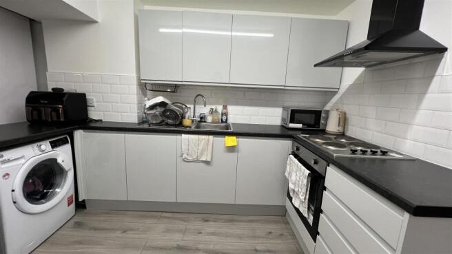 Modern kitchen with sleek gloss cabinetry...