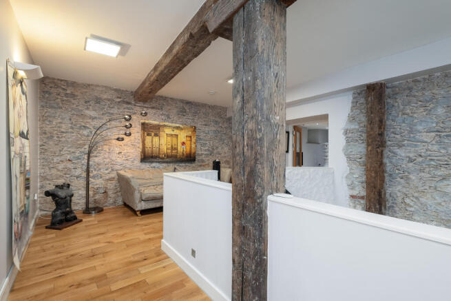 Elegant Landing - original warehouse beams & expos