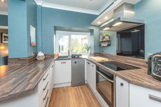 SITTING ROOM DINING AREA AND FITTED KITCHEN