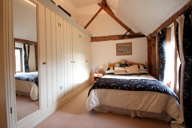 13'10 x 10' Bedroom 2 with wardrobes