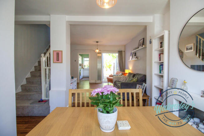 Sitting & dining room with gardens beyond