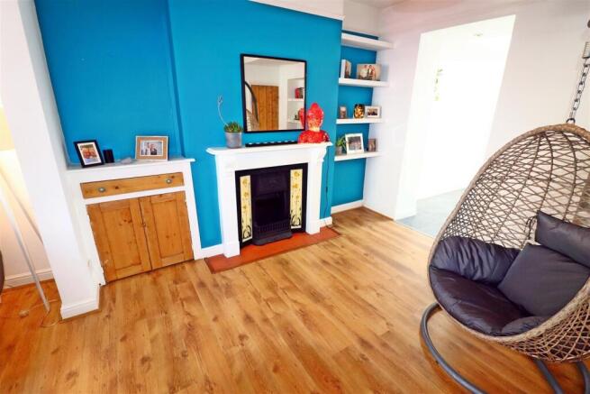 Stylish lounge with unique hanging chair...