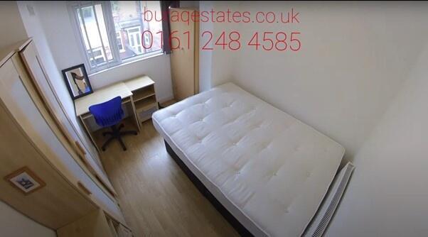 Bright, simply furnished double bedroom with a ...