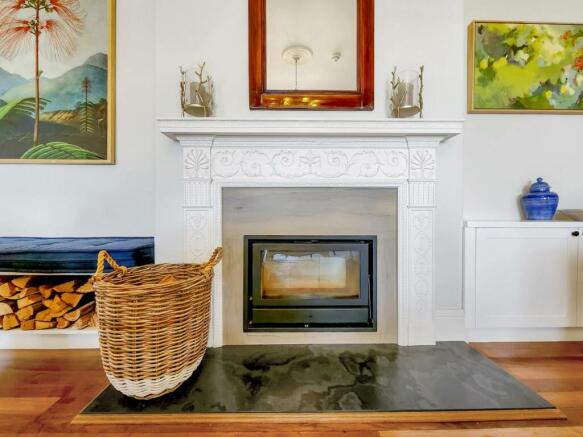 Woodburning fireplace in the communal lounge