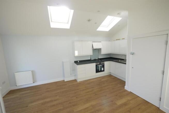 LIVING ROOM WITH OPEN PLAN KITCHEN