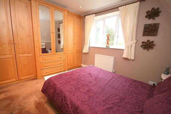 Bed 1 with built in Wardrobes