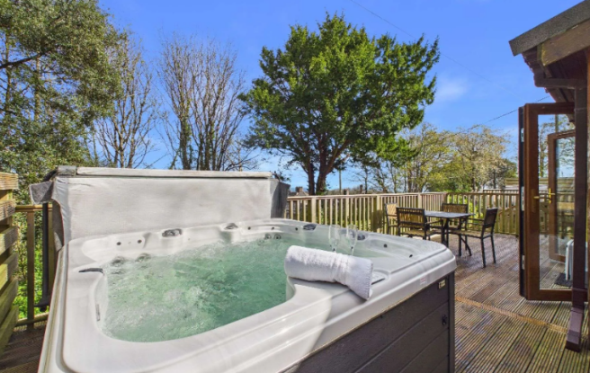 Private Hot Tub On The Decking Of The Deluxe Castl