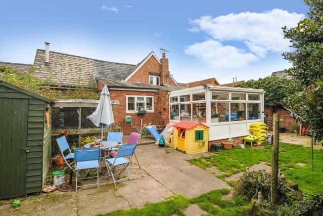 Rear terrace with conservatory/utility room