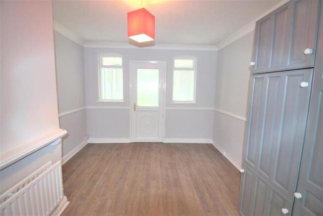 Bright modern room with sleek wood flooring...