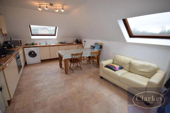 large kitchen with sofa