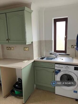 Utility Room Off Of Kitchen