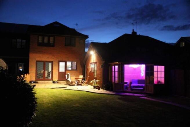 VENDORS NIGHT PHOTO REAR HOUSE