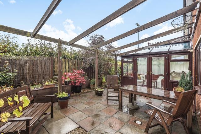 Private partly covered patio garden