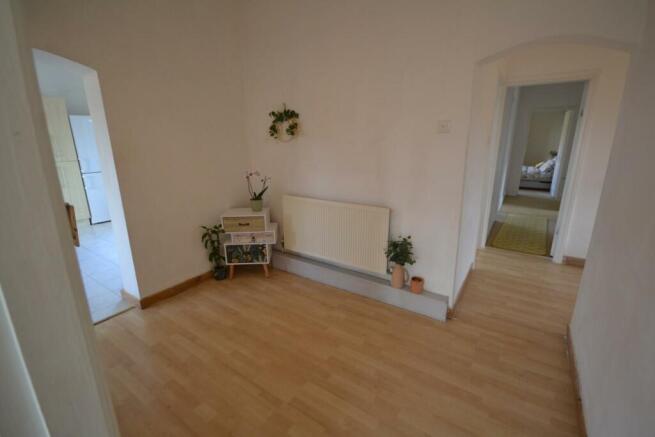 ENTRANCE HALL TO FAMILY ROOM AND KITCHEN