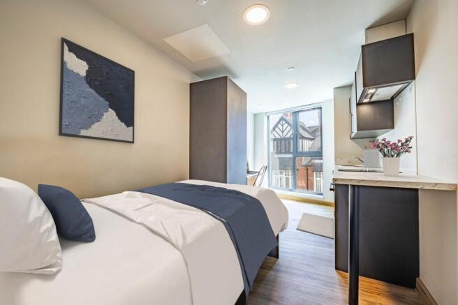 Bedroom, kitchen & living area