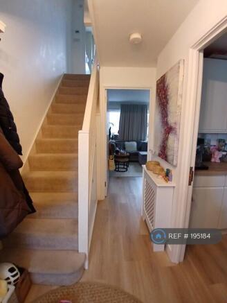 View From Front Door To Lounge And Up To Level Two