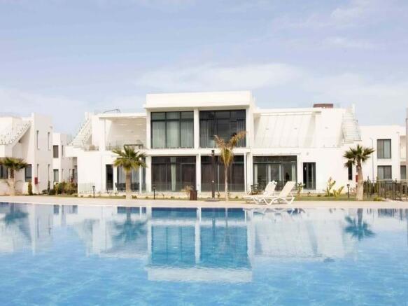 2-bedroom modern garden apartment + communal swimming pools + within a perfect holiday complex with many amenities Image 9999 1