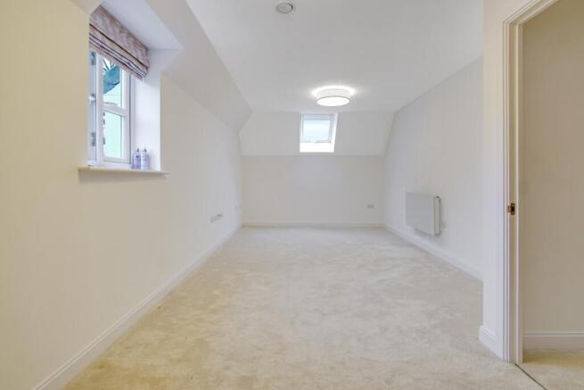 a hallway with a carpet