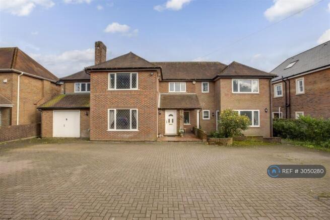 Front View And Driveway