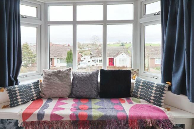 Bay fronted master bedroom with a view