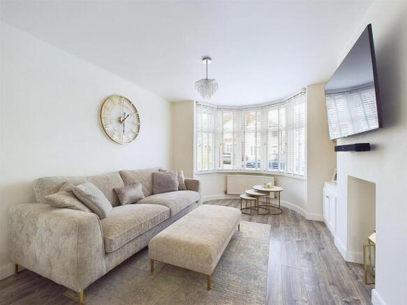Bright, stylish living room with a comfortable ...