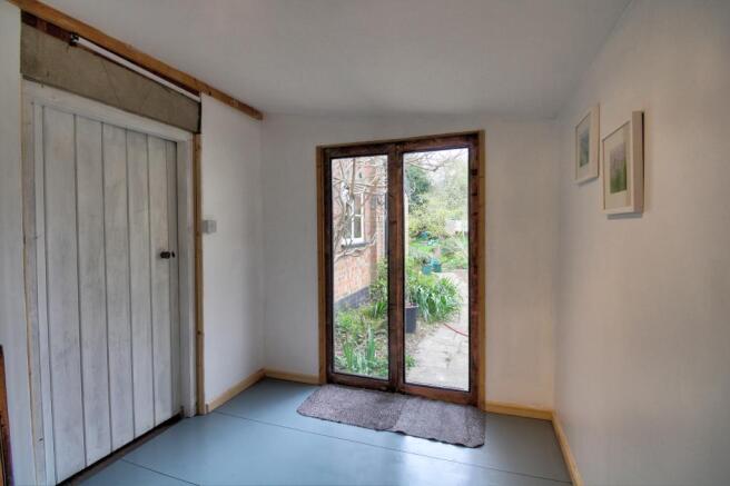 Sun Room Office French Doors into Garden
