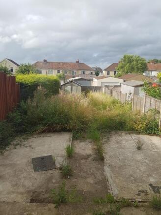 A spacious garden area with potential for outdo...