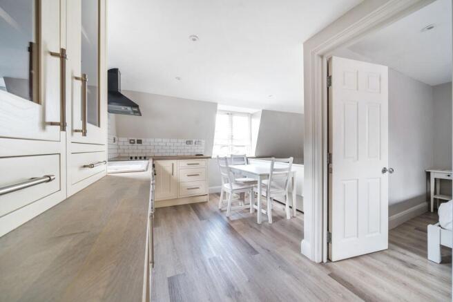 Bright modern kitchen with stylish dining area...