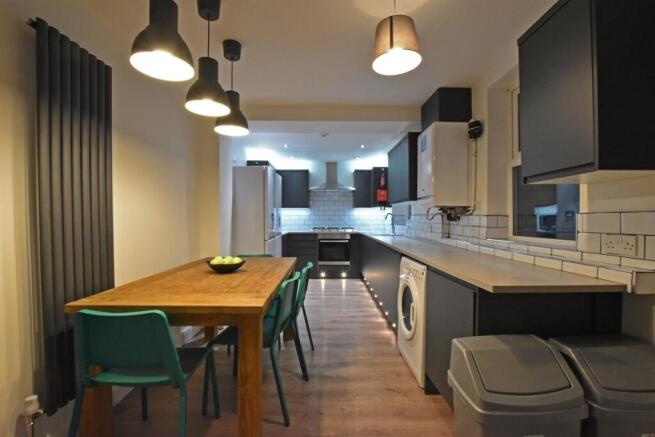 Spacious modern kitchen with dining area...