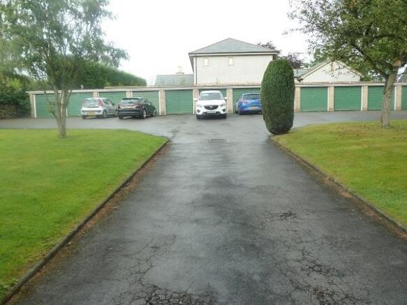 Rear garage and parking area
