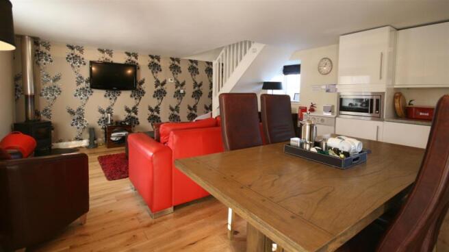 Aidan Cottage - Dining Table and Living Room1.jpg