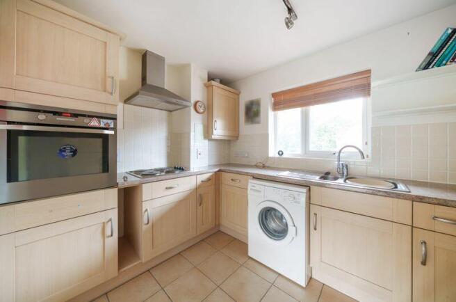 Kitchen with built-in appliances