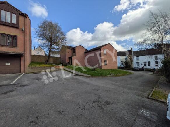Rear of flat and parking area