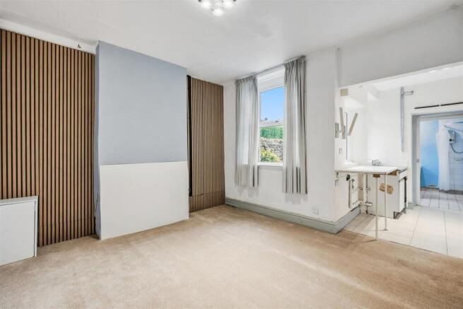 Dining Room towards window and Kitchen.jpg