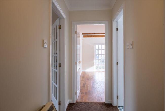 Hallway towards first Bedroom 1