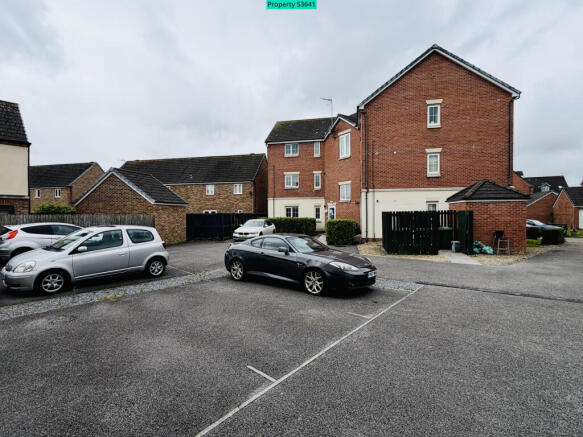 Parking area - allocated space with dark grey car
