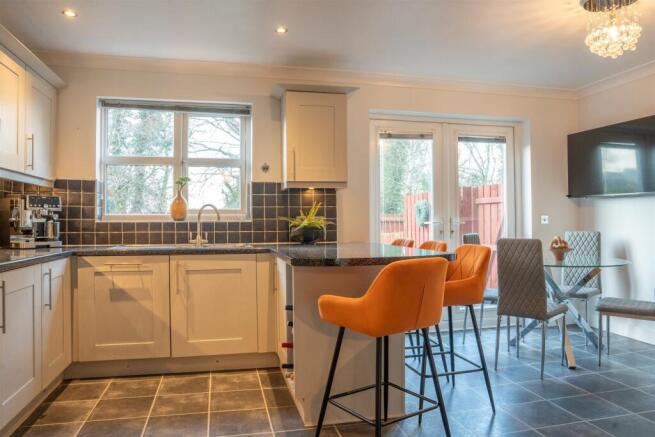 Stylsih Kitchen With Views To The Garden