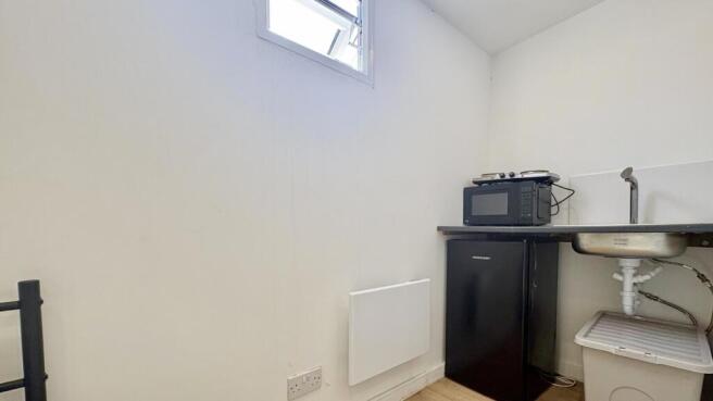 Bright kitchenette with modern appliances....