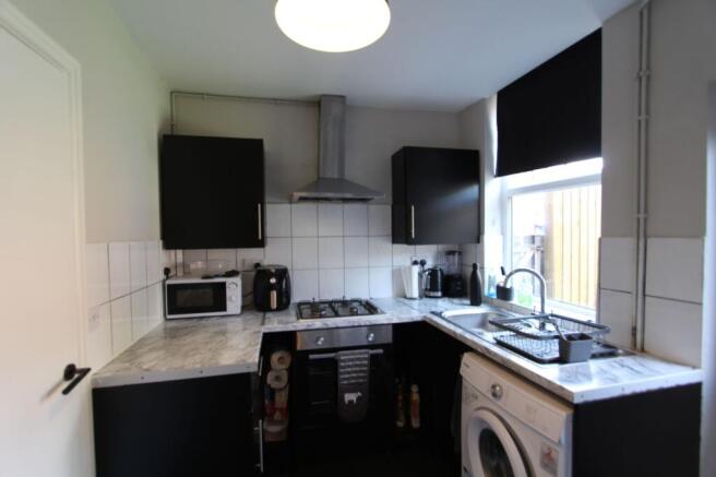 SITTING/DINING ROOM AND KITCHEN