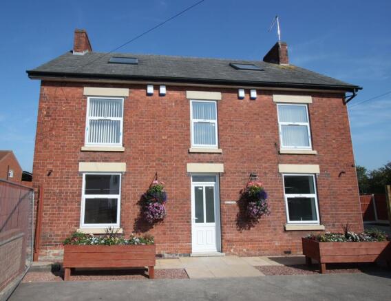 Front of House, entrance gate to left