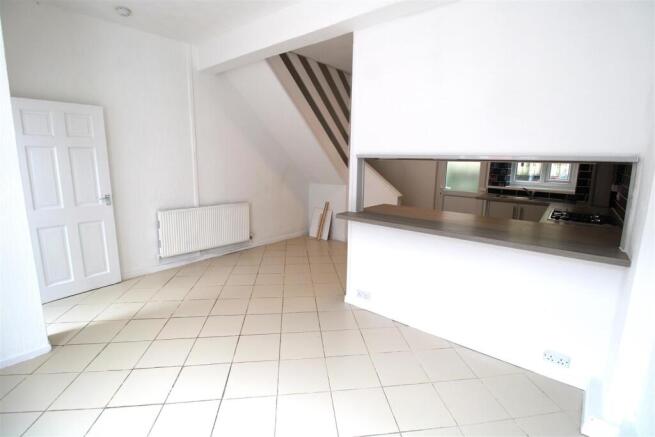 Bright open-plan space with breakfast bar...