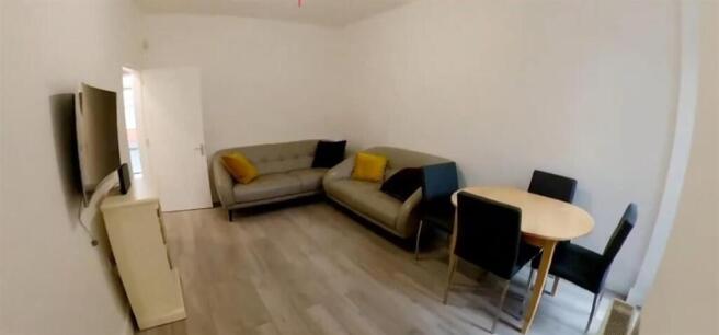 Spacious living room with comfortable sofas...