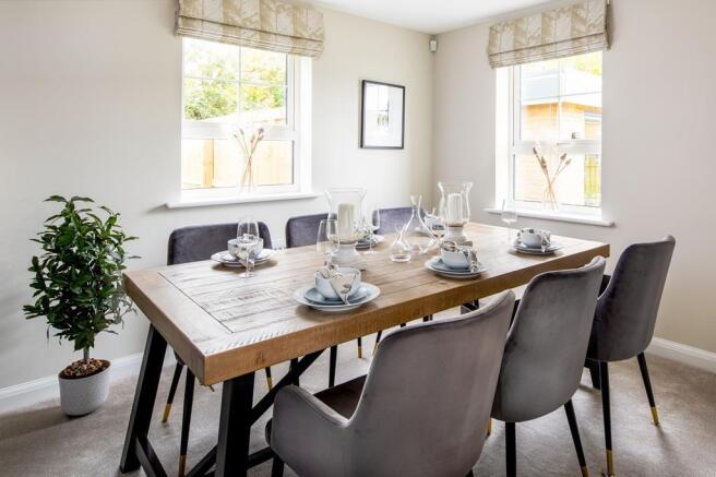 Dining room in the Alderney 4 bedrom home at Coat Grove