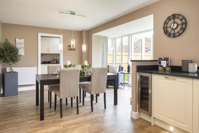 Family and dining area with glazed bay and French doors