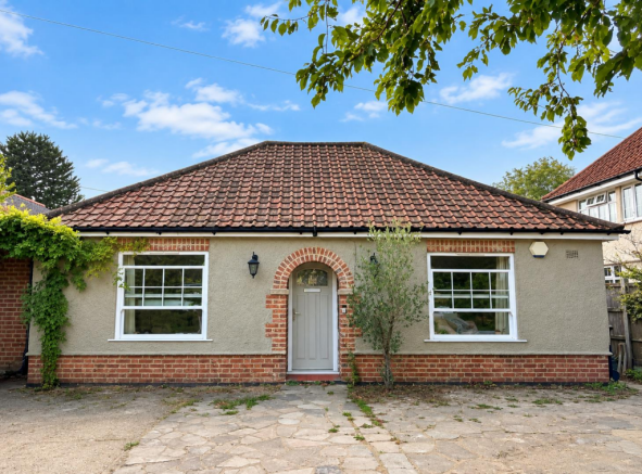 Bright Bungalow Facade in Daylight.png
