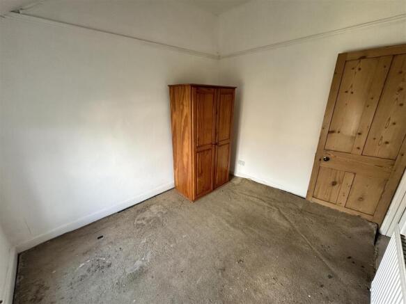 Spacious room with classic wooden wardrobe...