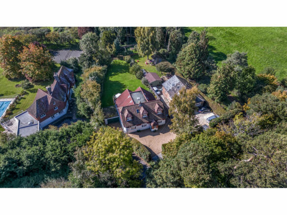 Warren Cottage driveway, garden and surrounding public footpathed open countryside