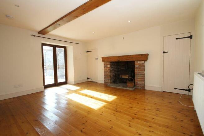 Sitting room with fireplace and inset...