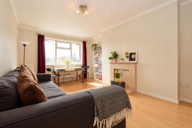 Sunlit Living Room with Plants.png